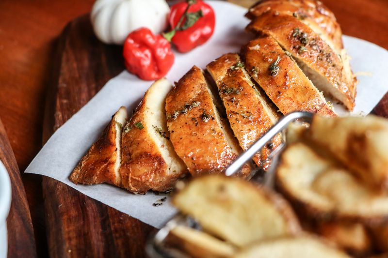 Parmesan Herb Wings with garlic butter coating