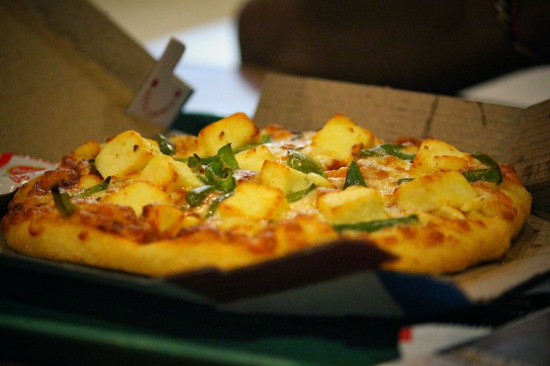 BBQ Bacon Crunch Pizza with crispy bacon and BBQ drizzle